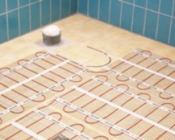 Теплый пол для обогрева ванной комнаты: электрический, водяной, инфракрасный